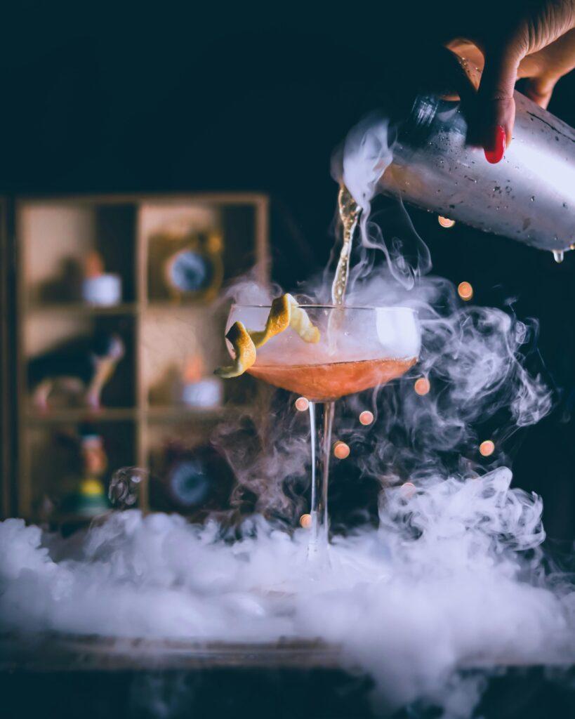 pexels-photo-15746326-15746326 Close-up of Bartender Preparing a Cocktail in Smoke